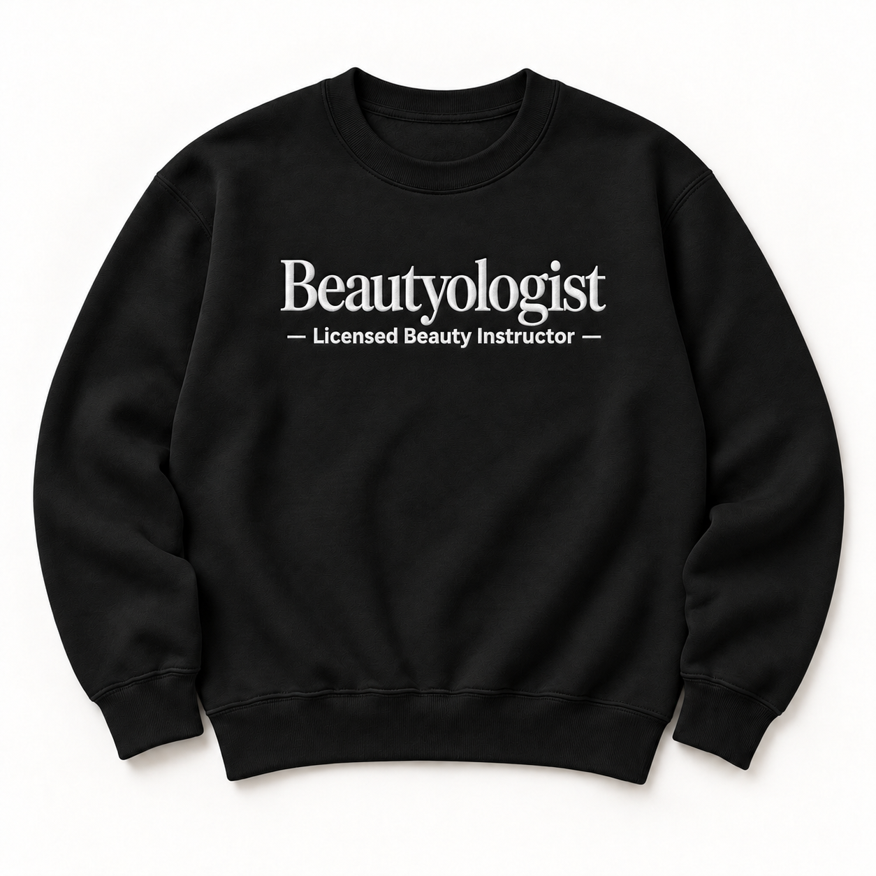 Beautyologist embroidered crewneck — Licensed Beauty Instructor — Black, iModel Apparel flat-lay mockup
