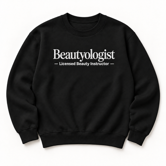 Beautyologist embroidered crewneck — Licensed Beauty Instructor — Black, iModel Apparel flat-lay mockup