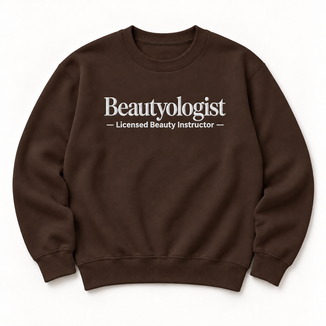 Beautyologist embroidered crewneck — Licensed Beauty Instructor — Dark Chocolate, iModel Apparel flat-lay mockup