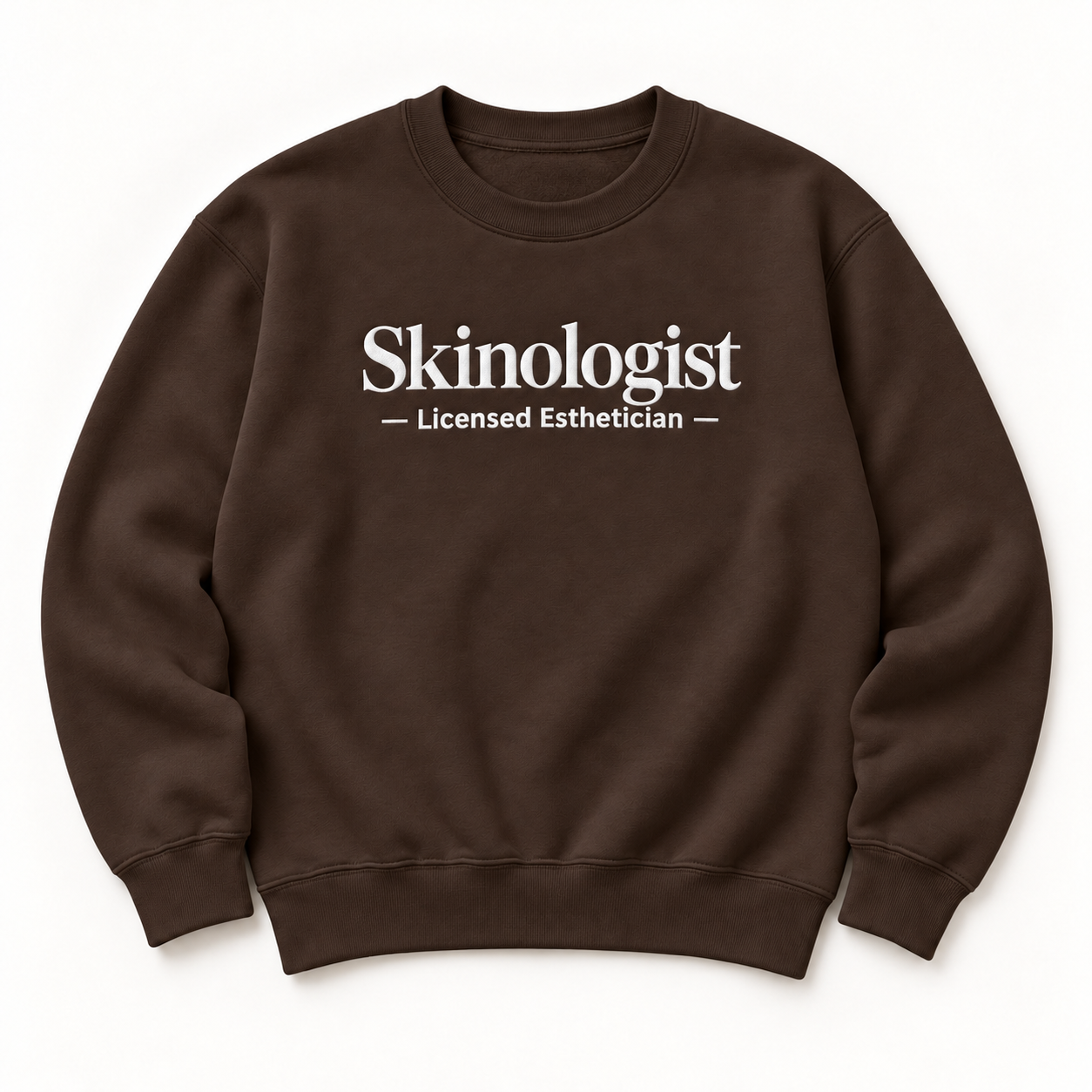 Skinologist embroidered crewneck — Licensed Esthetician — Dark Chocolate, iModel Apparel flat-lay mockup
